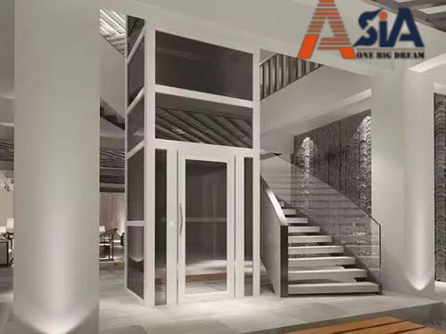 thang máy thủy lực tông trắng kính cường lực cho nhà phố hiện đại
